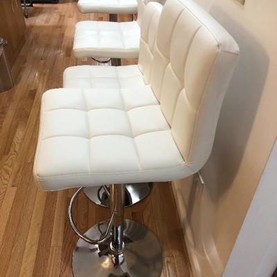 038: Four Like New Adjustable Vinyl Bar Stools 