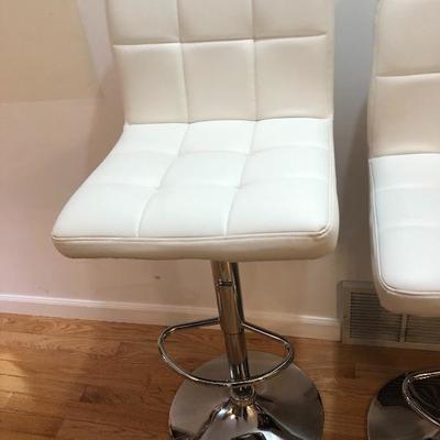 038: Four Like New Adjustable Vinyl Bar Stools 