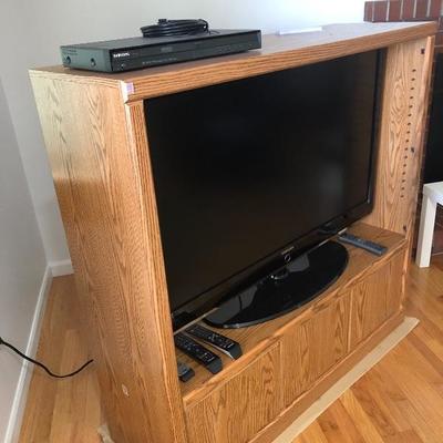 012:  50 Inch Samsung Flatscreen, Samsung DVD Player With Cabinet