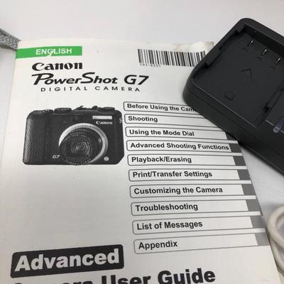 093:  Canon Powershot Camera With Charger