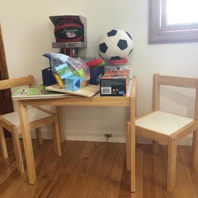 039:  Childâ€™s Table and Chairs With Toys 