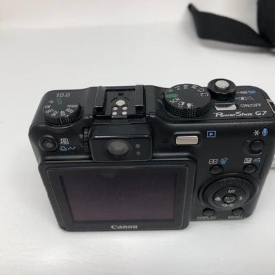 093:  Canon Powershot Camera With Charger