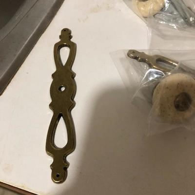 241:  Gold Tone and Porcelain Drawer Pulls