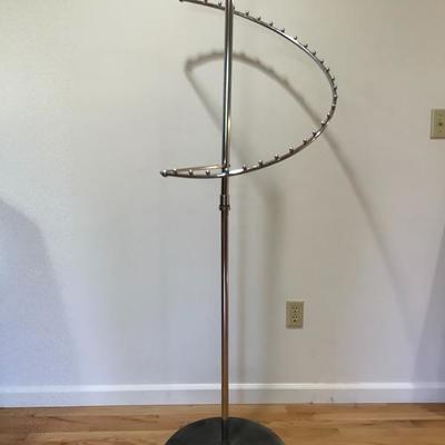 100:  Men's Suits and Spiral Clothing Rack