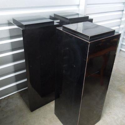 Lot 197: Three Glossy Black Art Display Pedestals