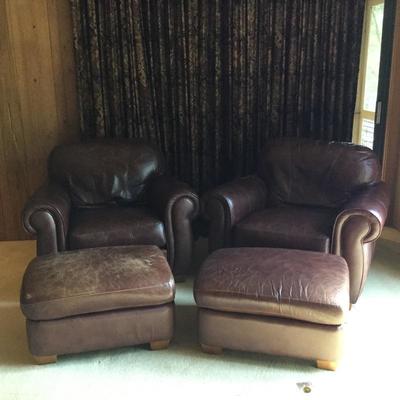 Lot 3 - Two Leather Chairs w/ Ottomans 