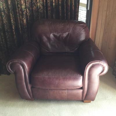 Lot 3 - Two Leather Chairs w/ Ottomans 
