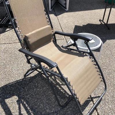 220:  Lounge Lawn Chair, Side Table and Propane Lantern