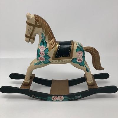 148:  Three Wooden Rocking Horses