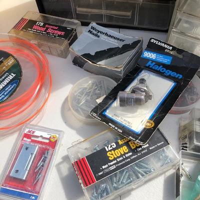 225:  Assortment of nuts and bolts including Nail Storage