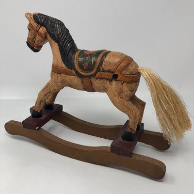 148:  Three Wooden Rocking Horses