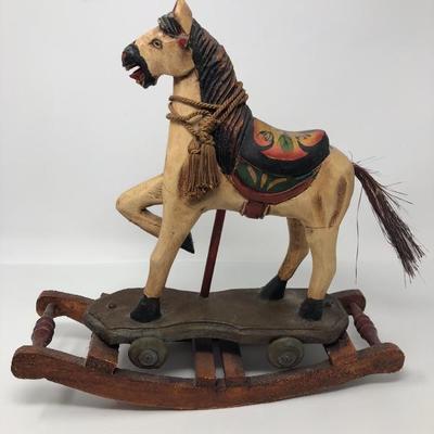 148:  Three Wooden Rocking Horses