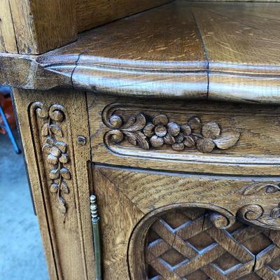 302:  Antique German Solid Wood Hand Carved Corner Hutch