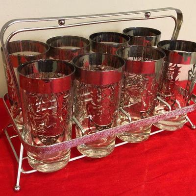 Lot 131 Vintage 8 tumbler's with rack
