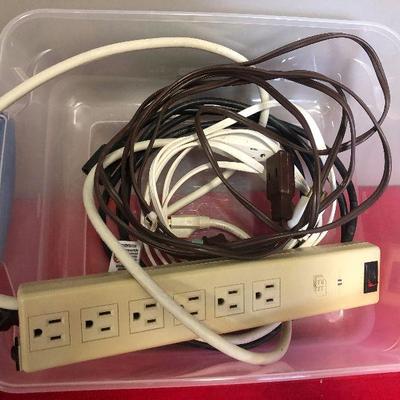 Lot 68 Plug bar and extension Cords