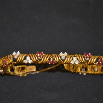 18K ruby and diamond bracelet.  36 rubies, 36 diamonds, purchased in 1976 for $2