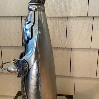 121 Metal Santa Candle Holder on Metal Chest