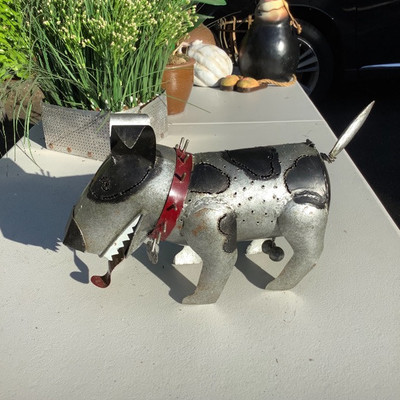 193 Three Artificial Plants and a Metal Dog Named Spike