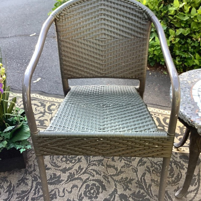 195 Wicker Chairs with Rock Top SalmonTable Outdoor Rug and Decor
