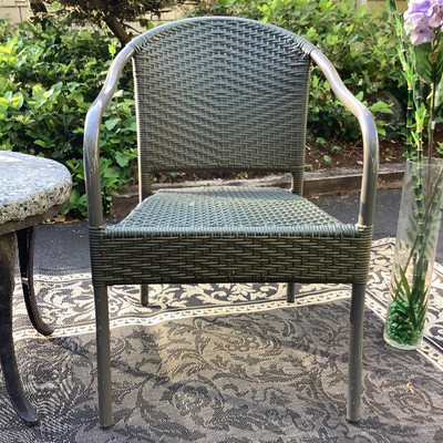 195 Wicker Chairs with Rock Top SalmonTable Outdoor Rug and Decor