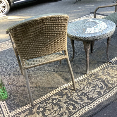 195 Wicker Chairs with Rock Top SalmonTable Outdoor Rug and Decor