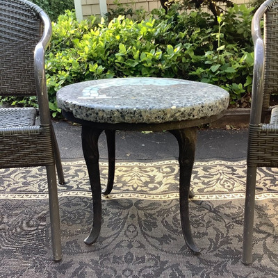195 Wicker Chairs with Rock Top SalmonTable Outdoor Rug and Decor