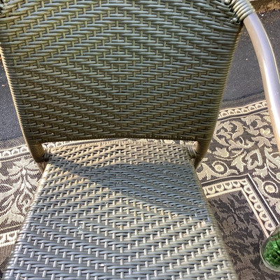 195 Wicker Chairs with Rock Top SalmonTable Outdoor Rug and Decor