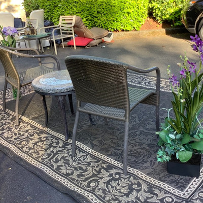 195 Wicker Chairs with Rock Top SalmonTable Outdoor Rug and Decor