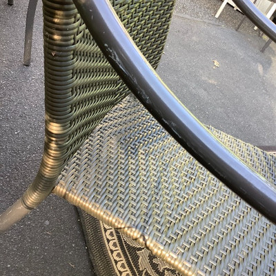 195 Wicker Chairs with Rock Top SalmonTable Outdoor Rug and Decor