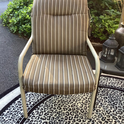196 Umbrella, Two Chairs, Indoor Rug, and Decor