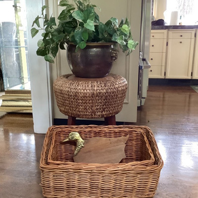 231 Rattan Stool with Wicker Baskets and Other Decor