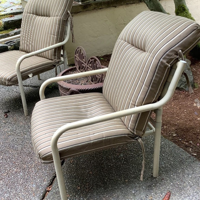 245 Two Outdoor Chairs and a Ceramic Flower Pot