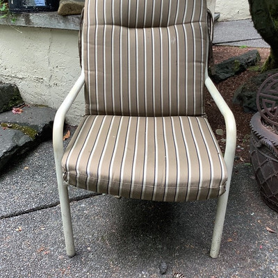 245 Two Outdoor Chairs and a Ceramic Flower Pot