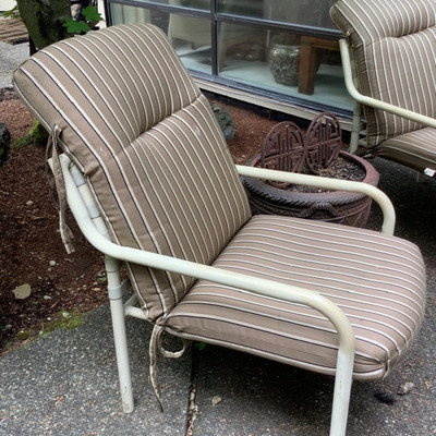 245 Two Outdoor Chairs and a Ceramic Flower Pot