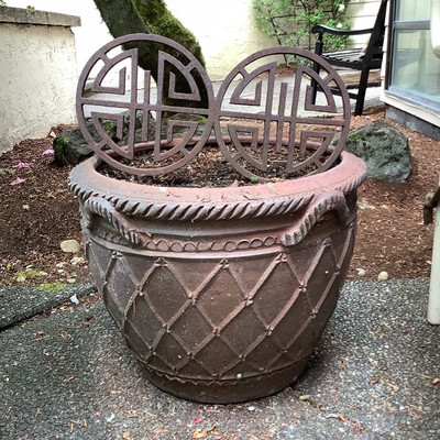 245 Two Outdoor Chairs and a Ceramic Flower Pot
