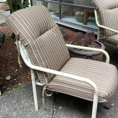 245 Two Outdoor Chairs and a Ceramic Flower Pot