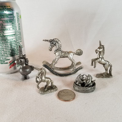 Five Pewter Unicorns