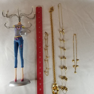 Gold Tone Necklaces and Unique Jewelry Holder