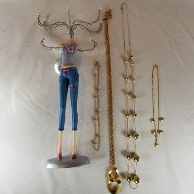 Gold Tone Necklaces and Unique Jewelry Holder
