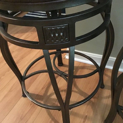 TWO LEATHER BAR STOOLS