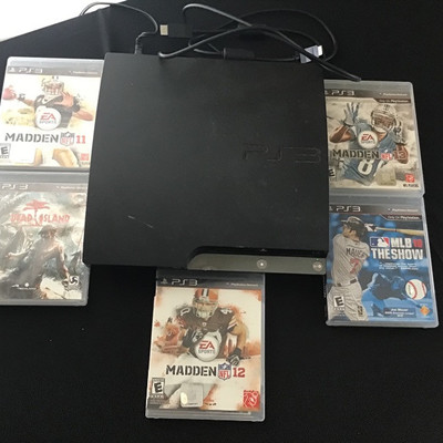 PS3 WITH 5 GAMES