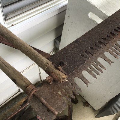 SET OF TWO VINTAGE FARM HAND SAW
