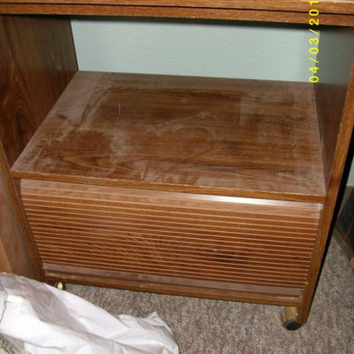 Microwave stand with roll top storage
