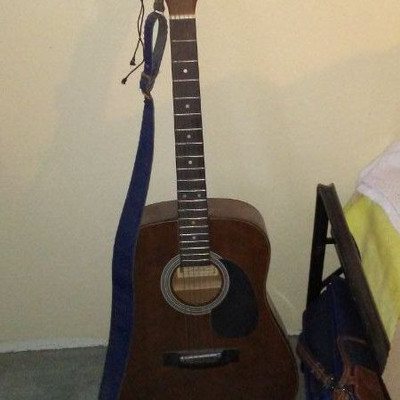 Guitar - has a dent in the bottom