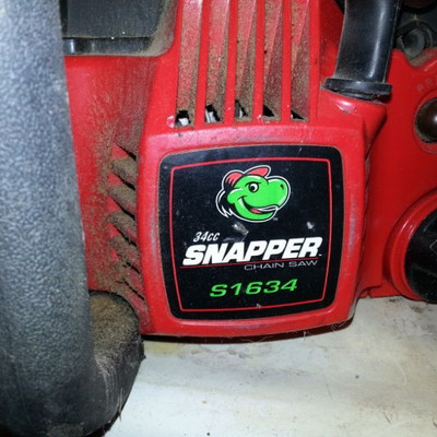 Snapper 16' chainsaw with bar oil and 2 cycle gas can