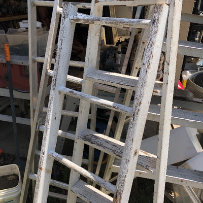  Two ladders pulled by a estate holder 