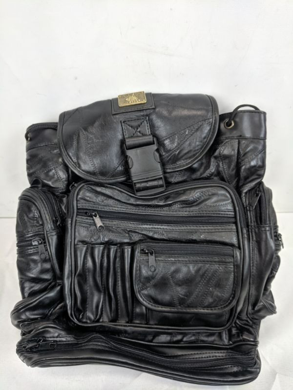 Pioneer Express Leather Medium Backpack | EstateSales.org