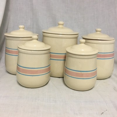 Lot 130 - McCoy Canisters
