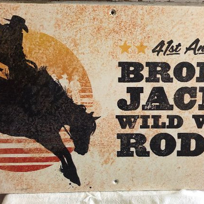 Lot 114 Bronco Jack's Wild West Rodeo Sign 