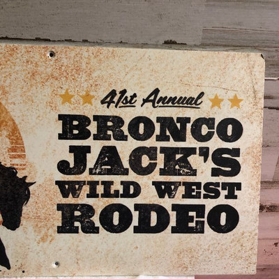 Lot 114 Bronco Jack's Wild West Rodeo Sign 